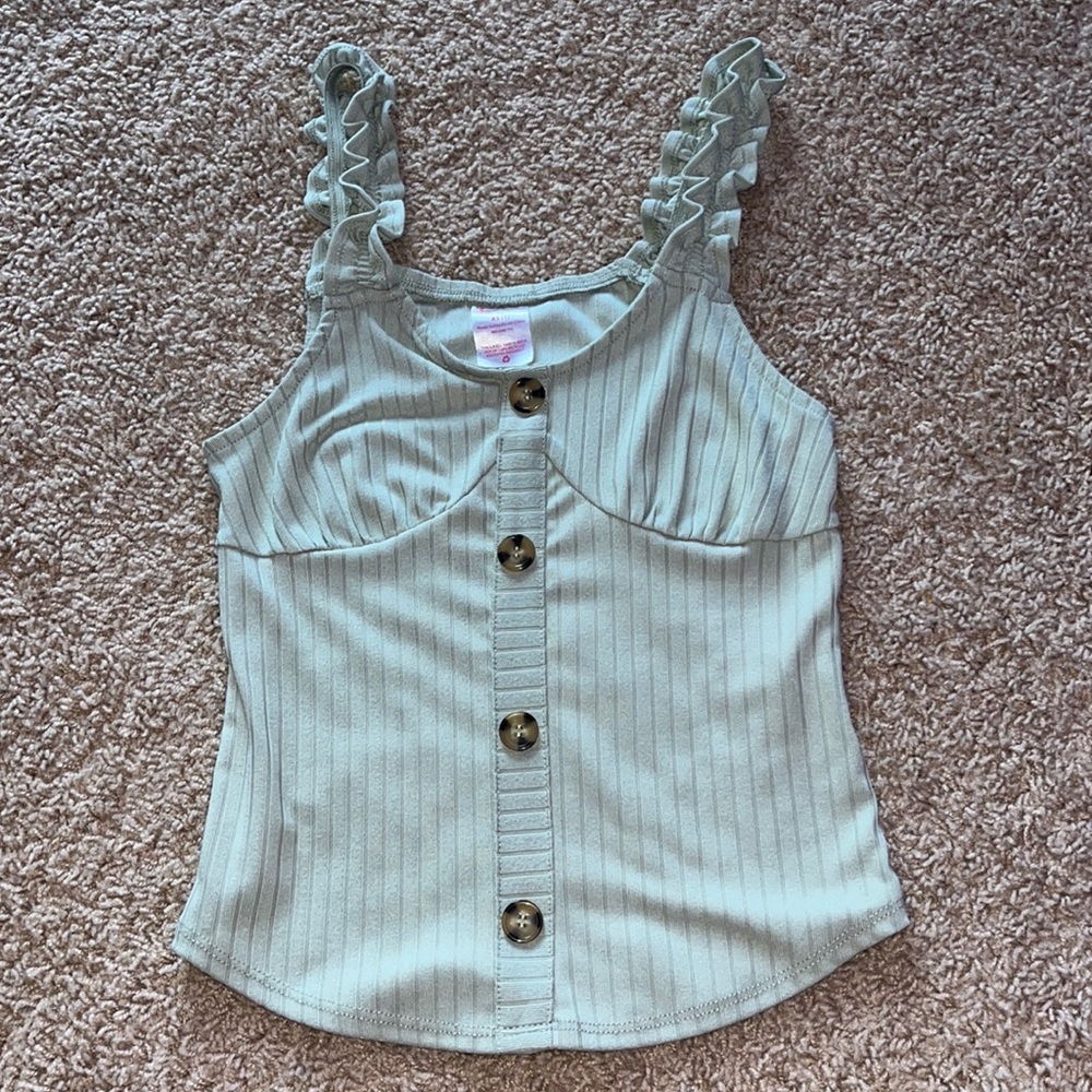 Form fitting. Fits a little bigger than an XS. Never worn.